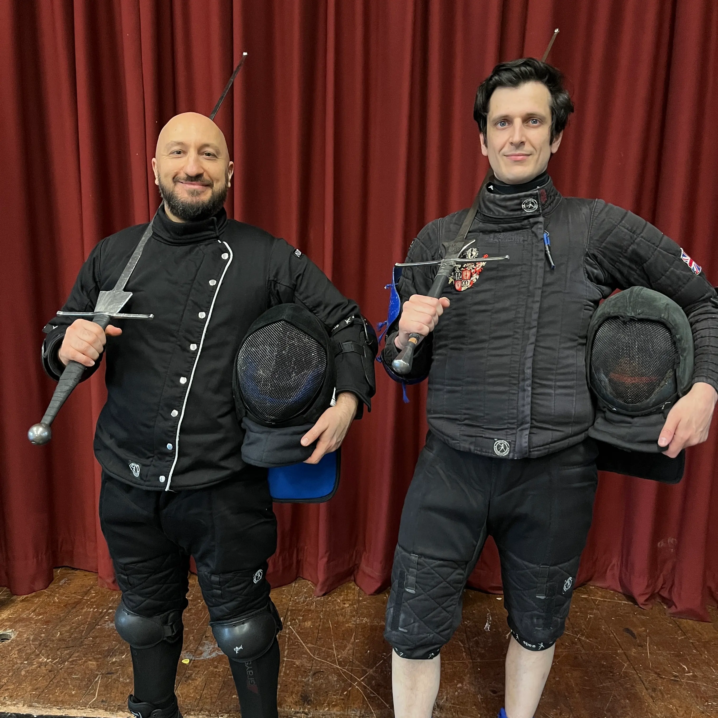 Olgun Tiltay learning Longsword from Cosmas Cieplak-Mayr von Baldegg HEMA instructor in Ausardia side by side